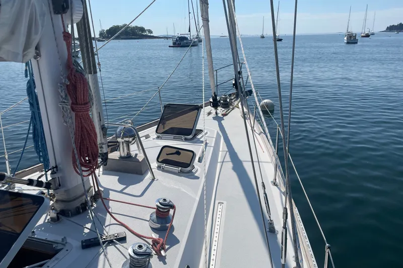 Slide: The Image of Sailboat deck view on water, Cambria 44/46, 1989 model, with ropes and winches. - 16