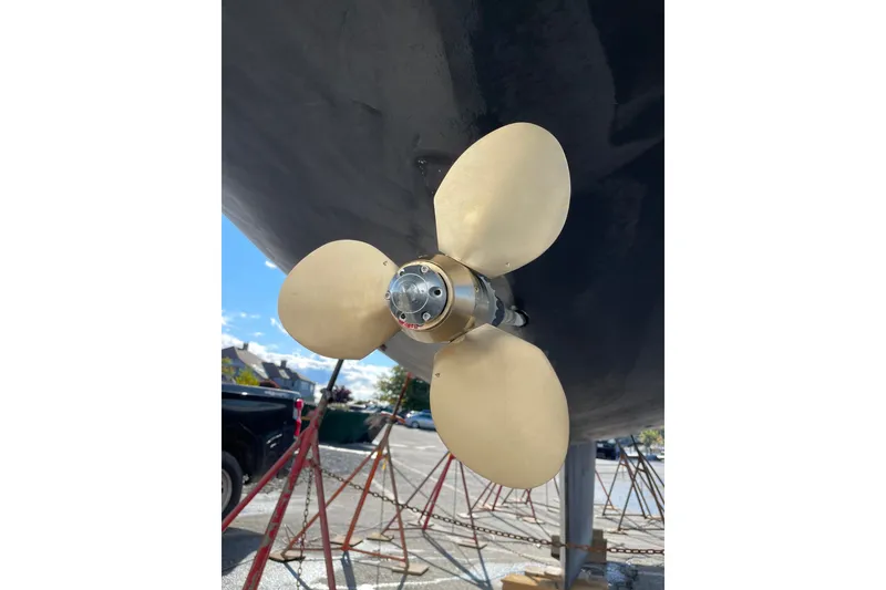 Slide: The Image of Propeller of 1989 Cambria 46 sailboat on display, with clear blue sky background. - 37