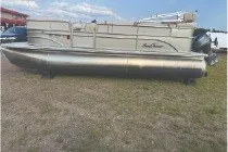 Slide: The Image of 2017 SMOKERCRAFT pontoon boat on grass, side view under clear sky. - 5