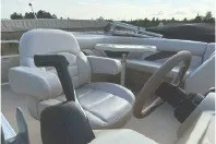Slide: The Image of 2017 SMOKERCRAFT boat interior with steering wheel and seating, showcasing luxury and comfort. - 12