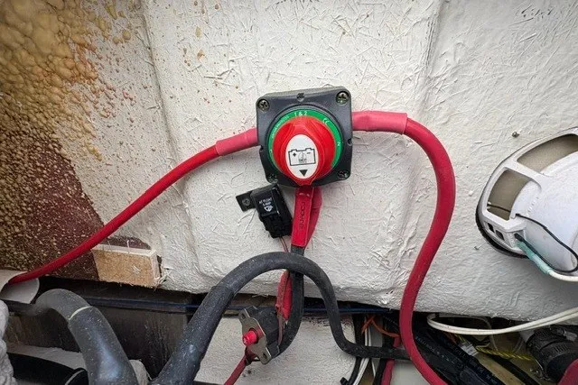 Slide: The Image of Battery switch and wiring on a 2020 Sea Hunt Ultra 225 boat. - 8