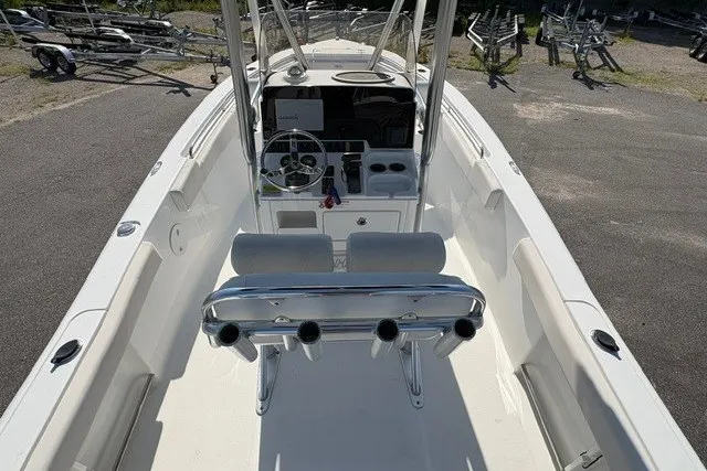 Slide: The Image of 2020 Sea Hunt Ultra 225 boat interior with steering console and seating. - 5