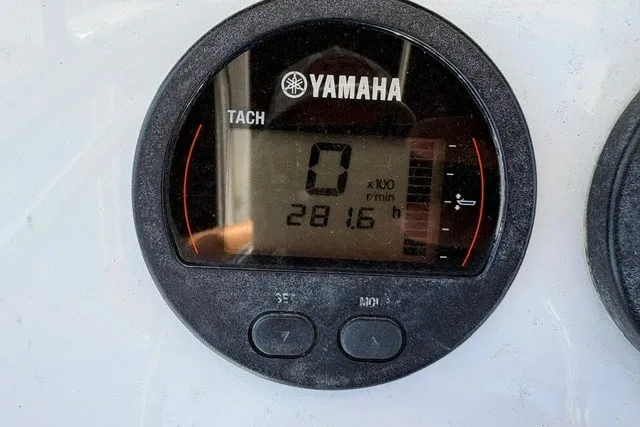 Slide: The Image of Yamaha tachometer on 2020 Sea Hunt Ultra 225, displaying 28.16 hours. - 13