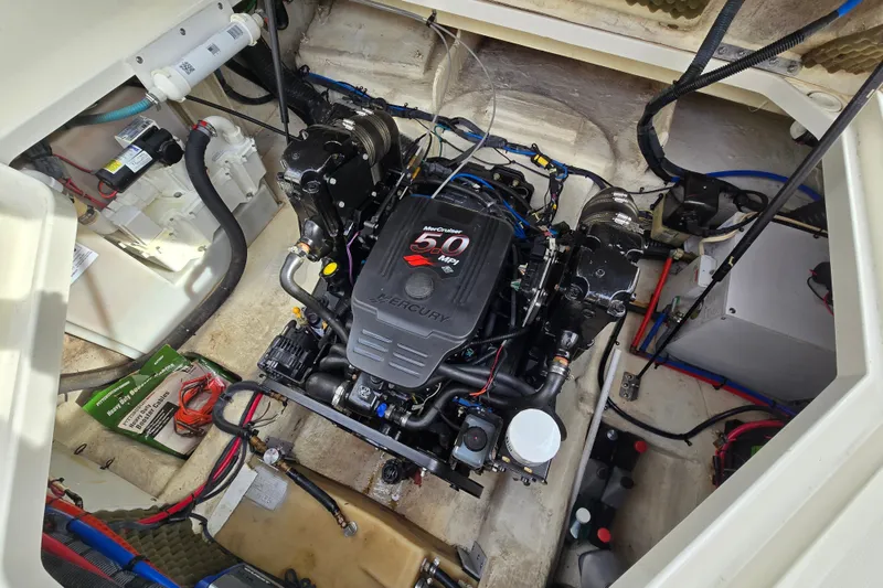Slide: The Image of Engine compartment of a 2006 Sea Ray 240 Sundancer with a Mercury 5.0 MPI engine. - 32