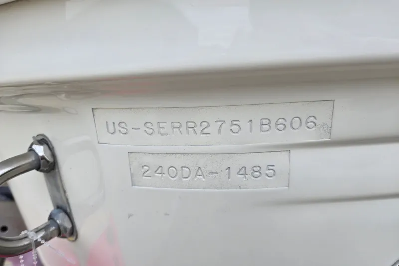 Slide: The Image of Hull identification number on 2006 Sea Ray 240 Sundancer boat. - 59