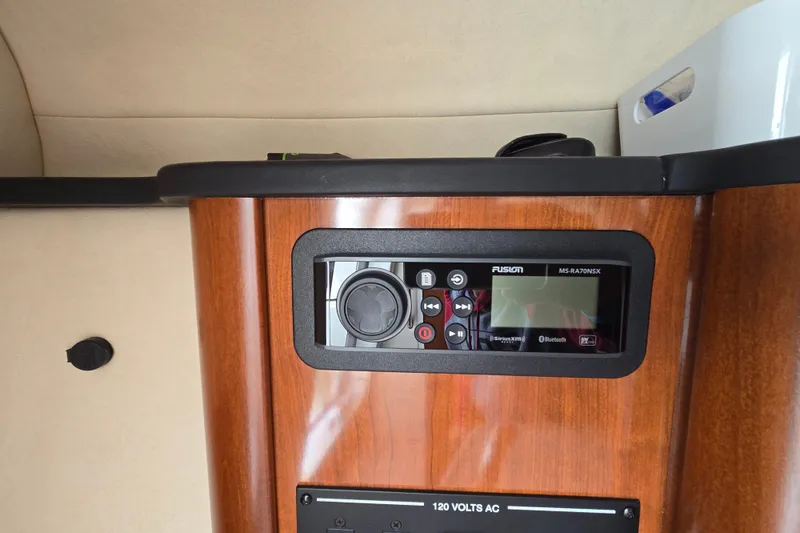 Slide: The Image of Fusion stereo system on 2006 Sea Ray 240 Sundancer boat interior. - 53