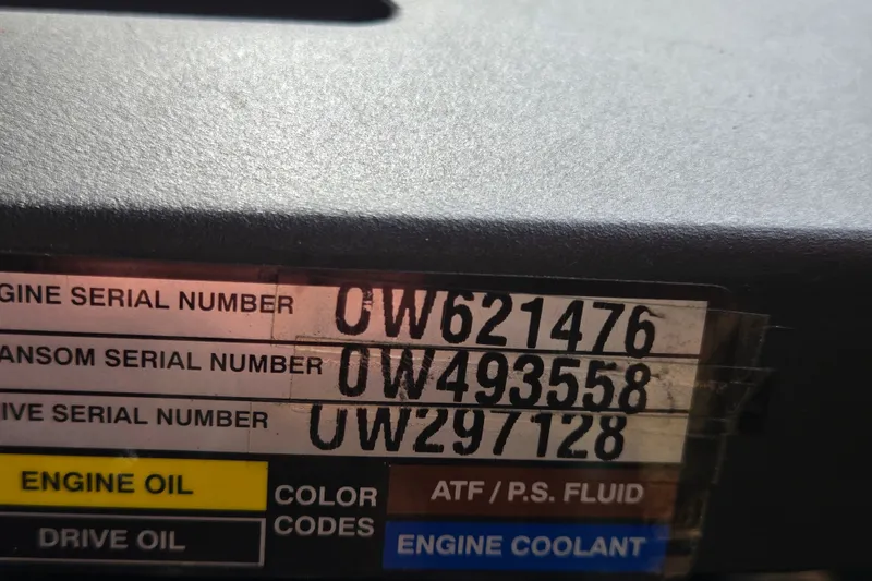 Slide: The Image of Serial numbers on a 2006 Sea Ray 240 Sundancer engine component. - 61