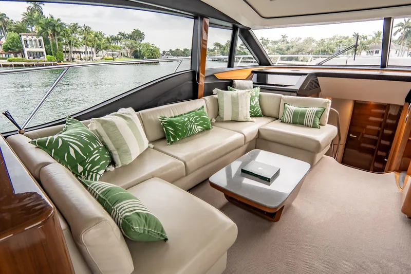 Slide: The Image of Luxurious interior of 2017 Princess S65 yacht with elegant seating and scenic water view. - 18