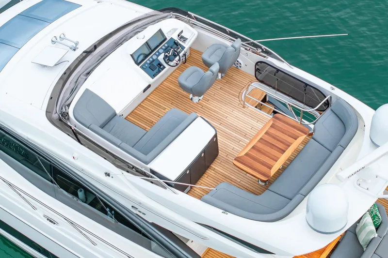 Slide: The Image of Luxurious 2017 Princess S65 yacht with spacious deck and modern seating arrangement. - 34
