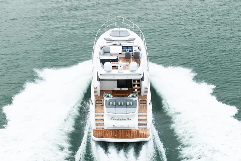 Slide: The Image of Luxury 2017 Princess S65 yacht cruising on open water, rear view. - 31