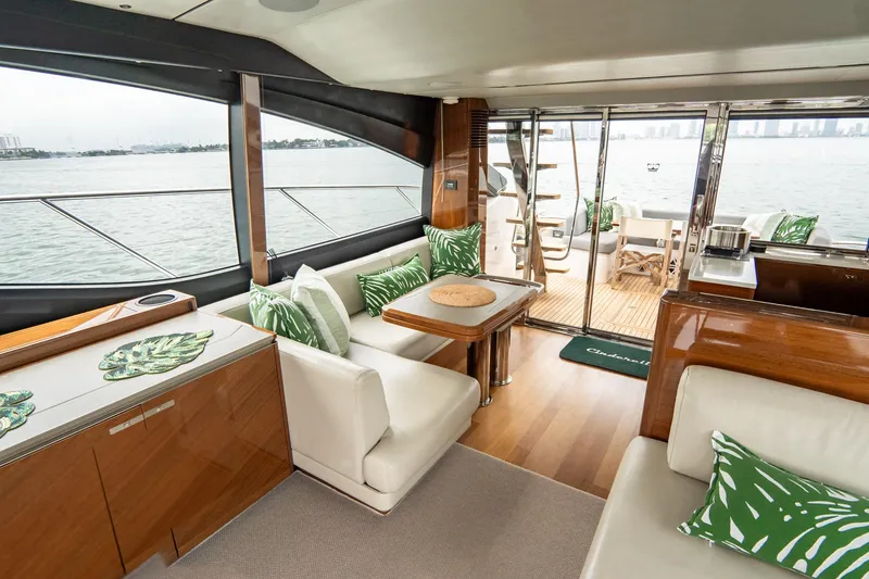 Slide: The Image of Luxurious 2017 Princess S65 yacht interior with elegant seating and scenic ocean views. - 15