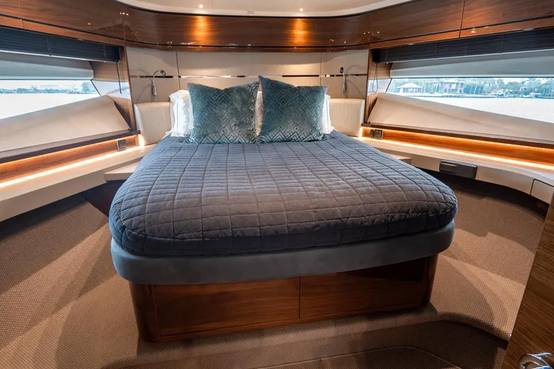 Slide: The Image of Luxurious 2017 Princess S65 yacht bedroom with elegant bedding and ambient lighting. - 19