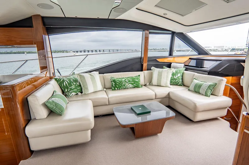 Slide: The Image of Luxurious 2017 Princess S65 yacht interior with elegant seating and scenic ocean view. - 17
