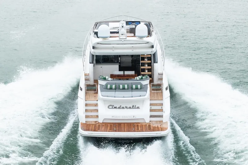 Slide: The Image of Luxurious 2017 Princess S65 yacht cruising on open water, rear view. - 32