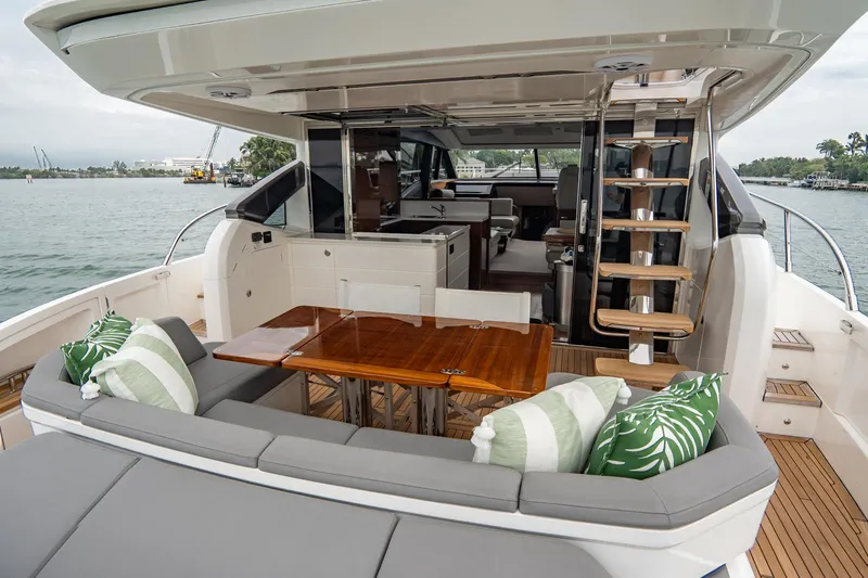 Slide: The Image of Luxurious 2017 Princess S65 yacht interior with seating, table, and modern design. - 44