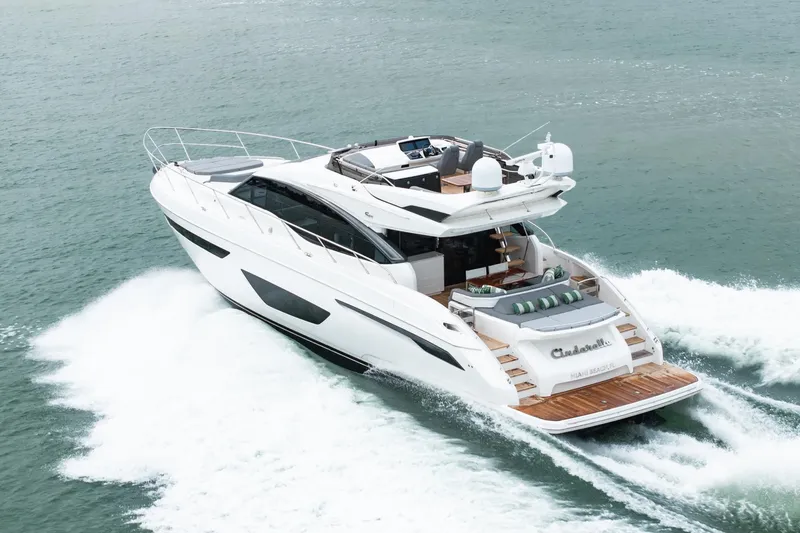 Slide: The Image of 2017 Princess S65 yacht cruising on open water, showcasing sleek design and luxury features. - 30