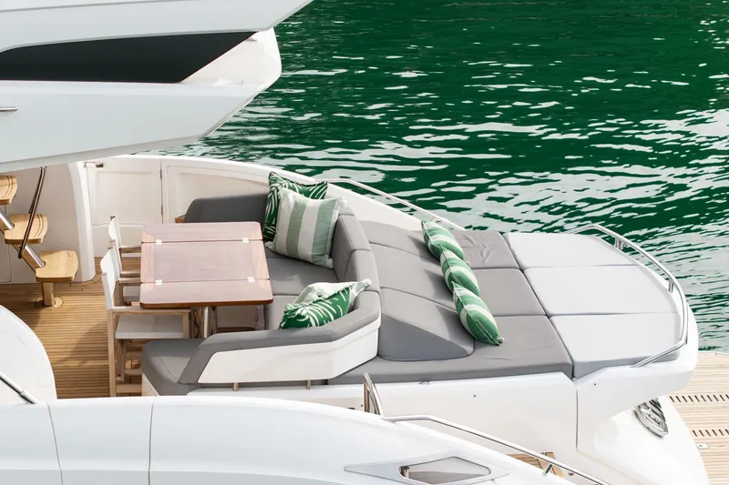 Slide: The Image of Luxurious 2017 Princess S65 yacht deck with seating and dining area by the water. - 46