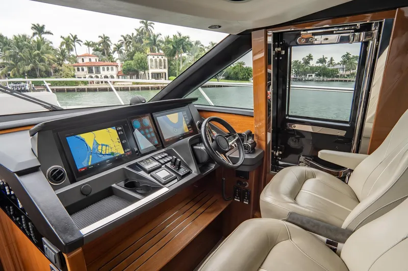 Slide: The Image of Luxurious 2017 Princess S65 yacht cockpit with advanced navigation system and plush seating. - 43