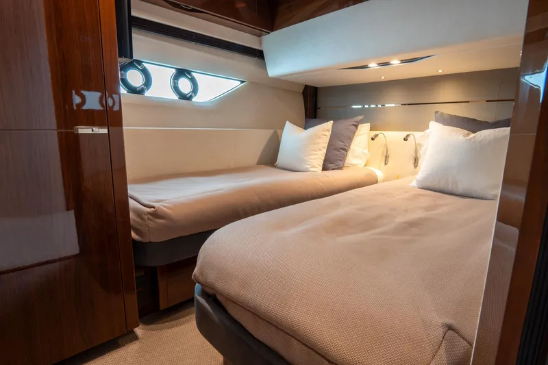 Slide: The Image of Luxurious cabin interior of 2017 Princess S65 yacht with twin beds and elegant decor. - 22