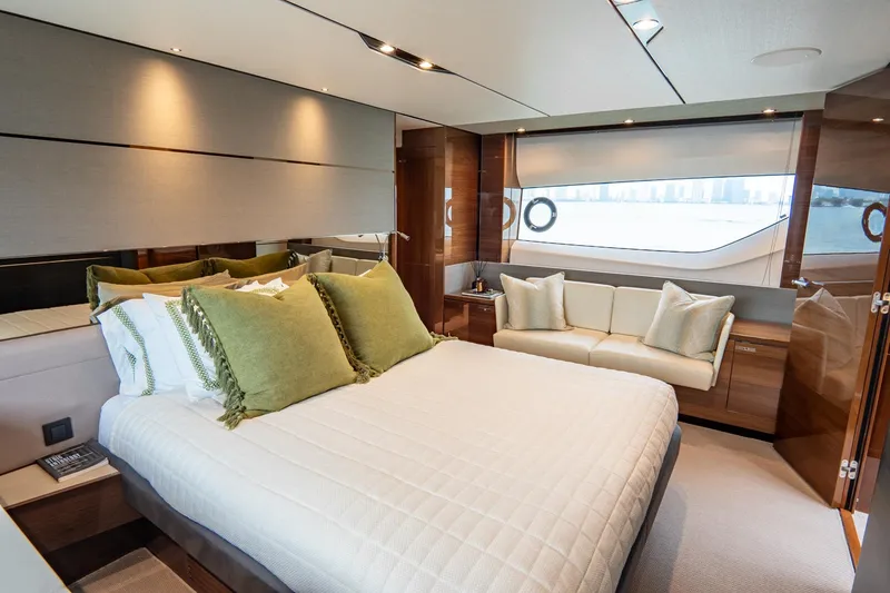 Slide: The Image of Luxurious bedroom interior of 2017 Princess S65 yacht with elegant decor and large windows. - 24