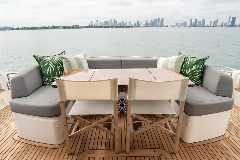 Slide: The Image of Luxury yacht deck with seating, table, and ocean view; Princess S65, 2017 model. - 48