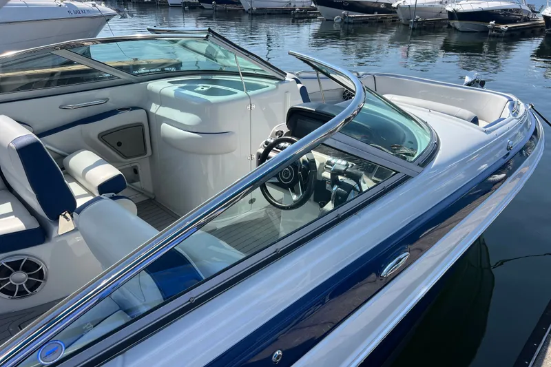 Slide: The Image of 2022 Crownline Eclipse E305 XS boat interior with sleek design and modern features. - 16