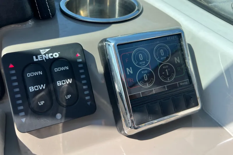 Slide: The Image of Control panel of 2022 Crownline Eclipse E305 XS boat with Lenco trim tabs. - 24