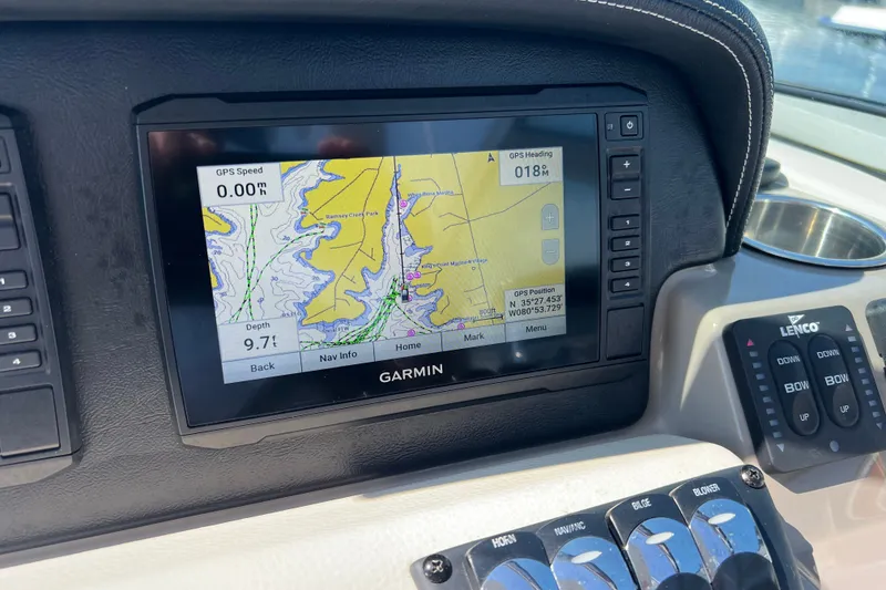 Slide: The Image of Garmin navigation display on 2022 Crownline Eclipse E305 XS boat dashboard. - 23