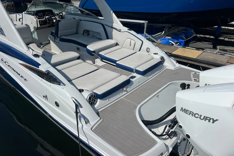 Slide: The Image of 2022 Crownline Eclipse E305 XS boat with spacious seating and Mercury engines. - 10
