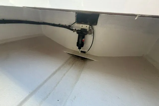 Slide: The Image of Interior view of a 2027 Conch 25 boat hull with visible wiring. - 7