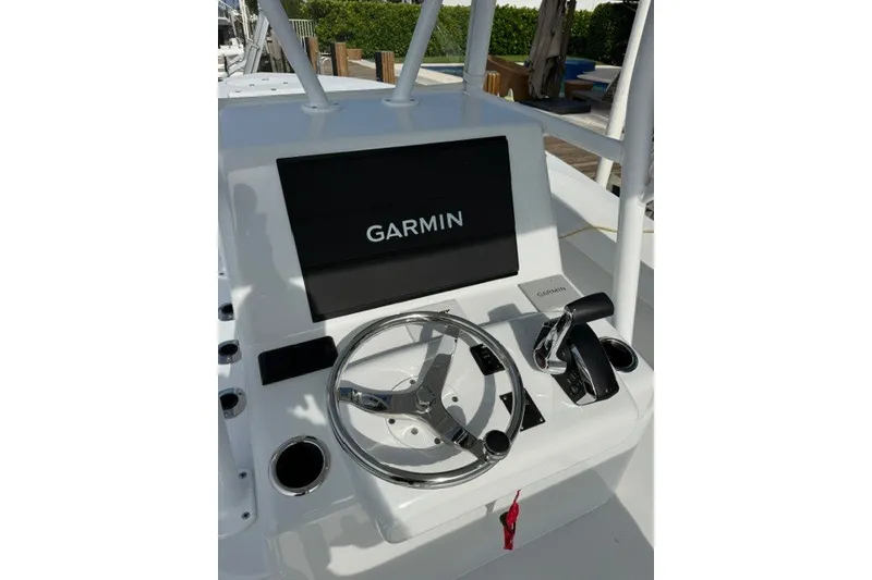 Slide: The Image of Steering console of 2027 Conch 25 boat with Garmin navigation system. - 3