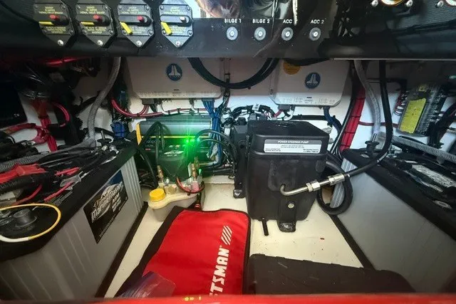 Slide: The Image of Electrical system of a 2027 Conch 25 boat, featuring wiring and components. - 13