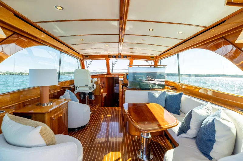 Slide: The Image of Luxurious interior of 2014 Hinckley Talaria 48 Flybridge yacht with elegant wood finish. - 19