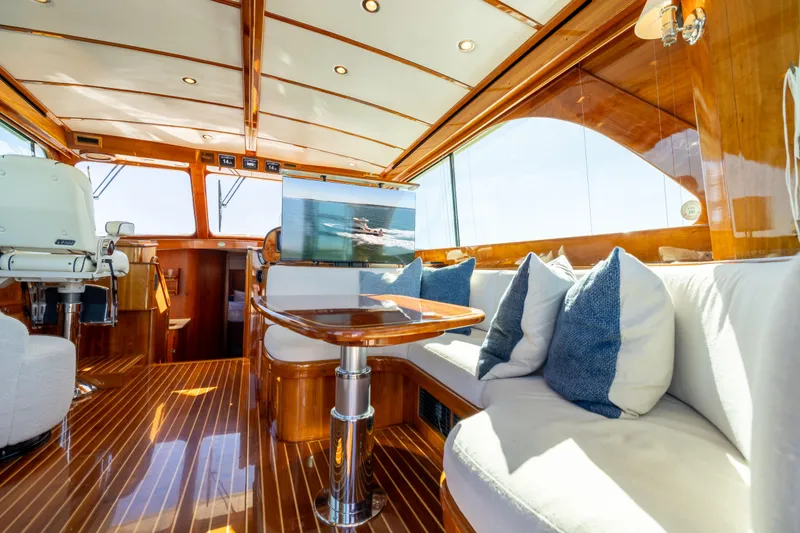 Slide: The Image of Luxurious interior of 2014 Hinckley Talaria 48 Flybridge yacht with elegant wood finish. - 22