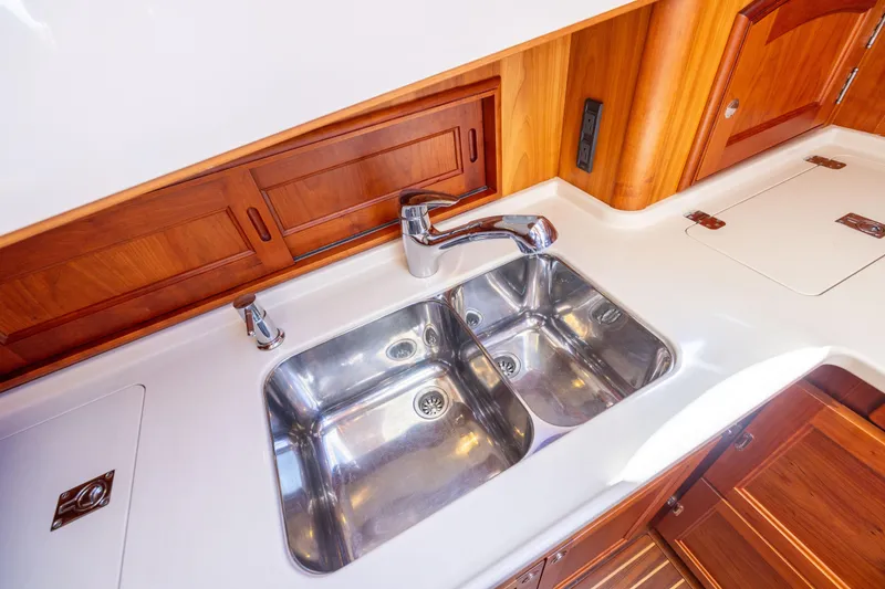 Slide: The Image of Stainless steel sink in 2014 Hinckley Talaria 48 Flybridge yacht kitchen. - 34