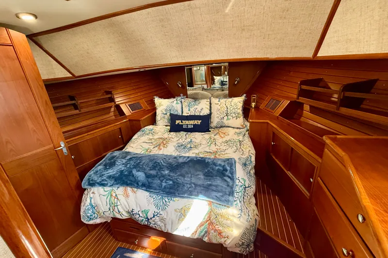 Slide: The Image of Luxurious cabin interior of 2003 Grand Banks 49 Eastbay HX yacht with cozy bedding. - 62