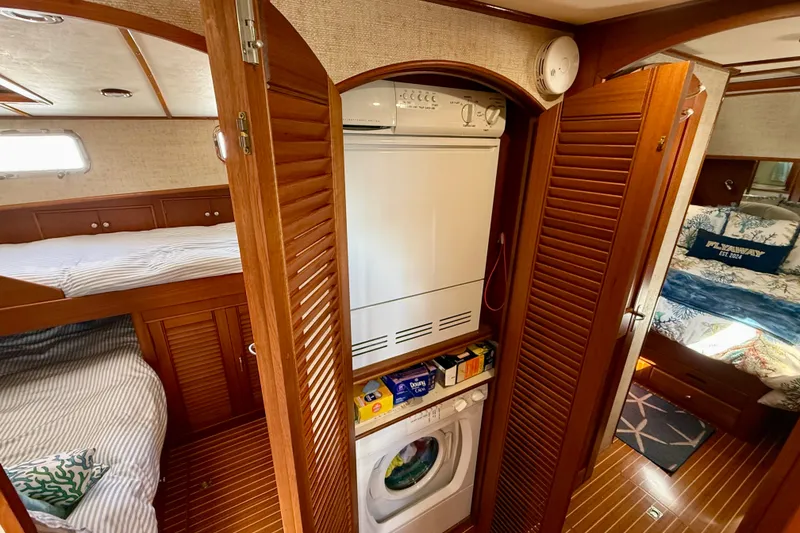 Slide: The Image of Interior of 2003 Grand Banks 49 Eastbay HX with cozy cabin and laundry area. - 61