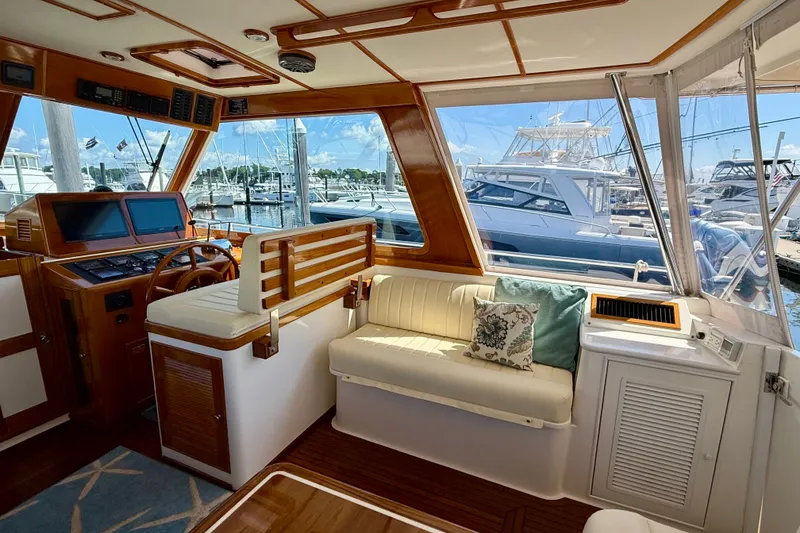 Slide: The Image of Luxurious 2003 Grand Banks 49 Eastbay HX yacht interior with helm and seating area. - 37