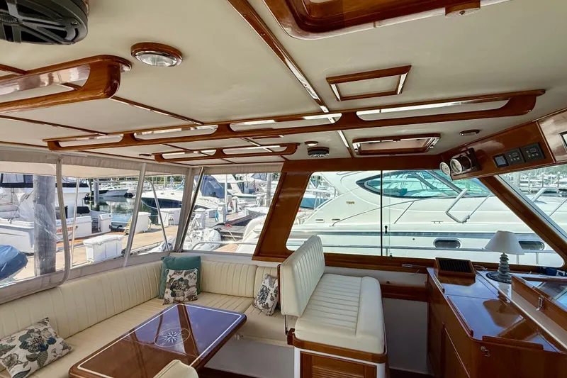 Slide: The Image of Luxurious interior of 2003 Grand Banks 49 Eastbay HX yacht with elegant wood finishes. - 39