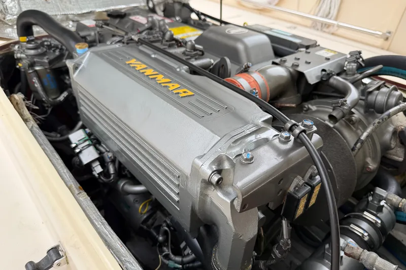 Slide: The Image of Engine of a 2006 Albin 28 Gatsby Edition boat, featuring a Yanmar diesel engine. - 57