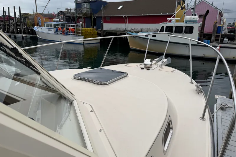 Slide: The Image of 2006 Albin 28 Gatsby Edition boat docked in a marina with other vessels. - 66