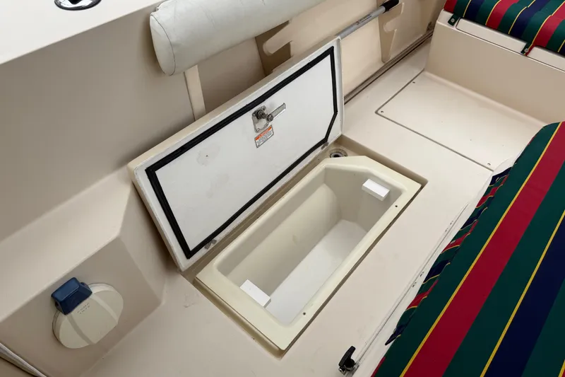 Slide: The Image of Open storage compartment on 2006 Albin 28 Gatsby Edition boat interior. - 60
