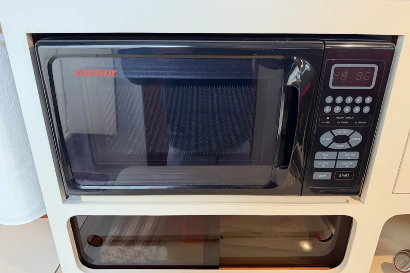 Slide: The Image of Built-in Tappan microwave in a 2006 Albin 28 Gatsby Edition boat kitchen. - 43