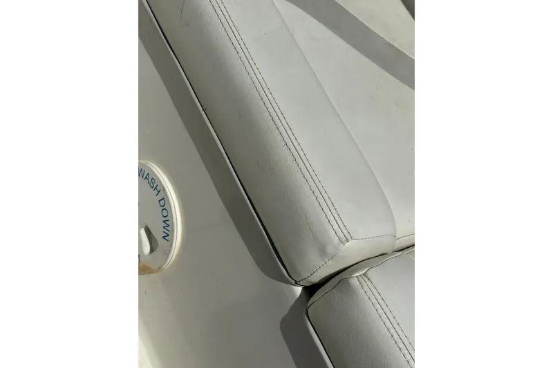 Slide: The Image of Close-up of 2012 Sundance NX25 boat seat and washdown area. - 40
