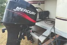 Slide: The Image of 2000 Tahoe Pontoon boat with Mercury outboard motor, side view. - 7