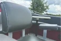 Slide: The Image of Tahoe Pontoon 2000 model seating with gray upholstery and armrest, outdoors. - 14