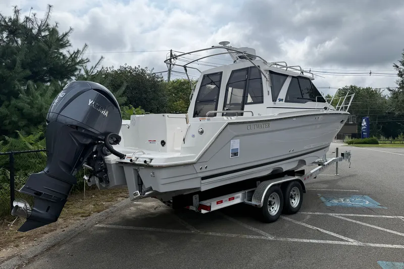 Slide: The Image of 2026 Cutwater C-248 Coupe boat on trailer, featuring Yamaha outboard motor. - 4