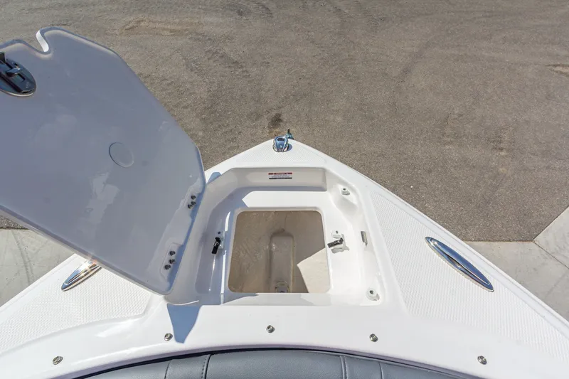 Slide: The Image of Open storage compartment on 2026 Chaparral 23 SSi boat deck. - 35