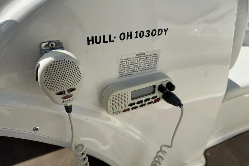 Slide: The Image of 2006 Larson 180 I/O boat with radio equipment and hull identification number. - 19