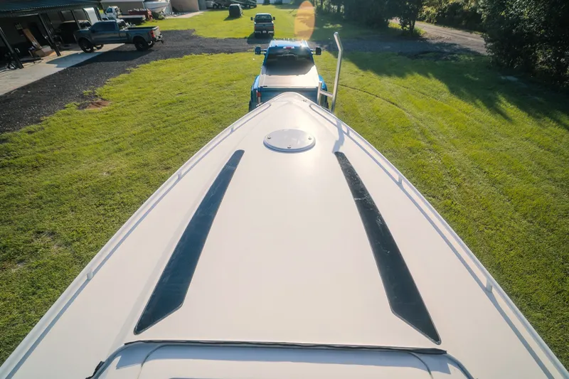 Slide: The Image of Top view of a 2020 Concept 44' Cuddy Cabin boat on a trailer. - 23